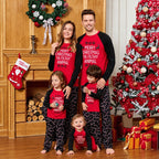 Family matching Christmas pajamas with red raglan slogan tops and black candy cane print pants