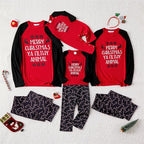 Family matching Christmas pajamas with red raglan slogan tops and black candy cane print pants - view 7