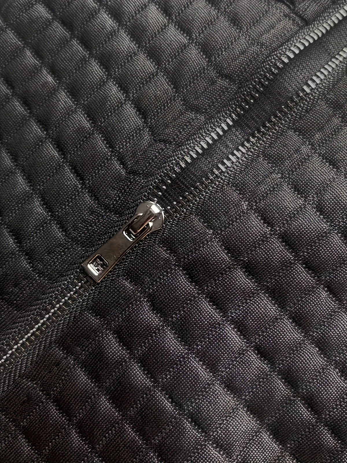 Woman wearing an oversized waffle knit quarter zip sweater with stand collar and ribbed cuffs - view 26