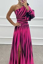 Woman wearing a striped one-shoulder maxi dress with balloon sleeve, ruched waist and high slit - view 8