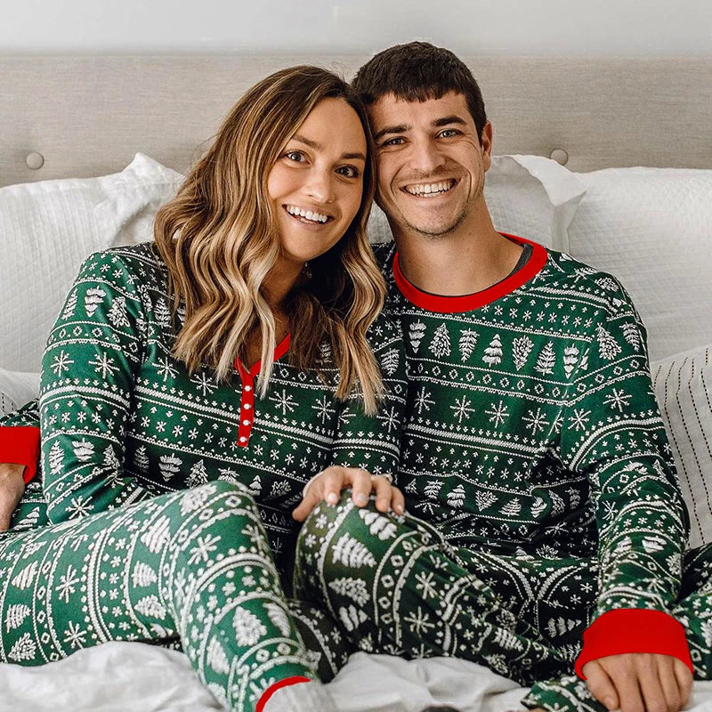 Green and white holiday print matching Christmas pajama sets for couples with red trim