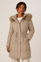 Long chevron-quilted puffer jacket with faux fur hood trim and drawstring waist
