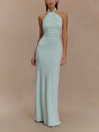 Halter maxi dress with twisted neckline, ruched waist and low open back