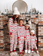 Matching family Christmas pajamas with red reindeer Fair Isle print and red ribbed cuffs
