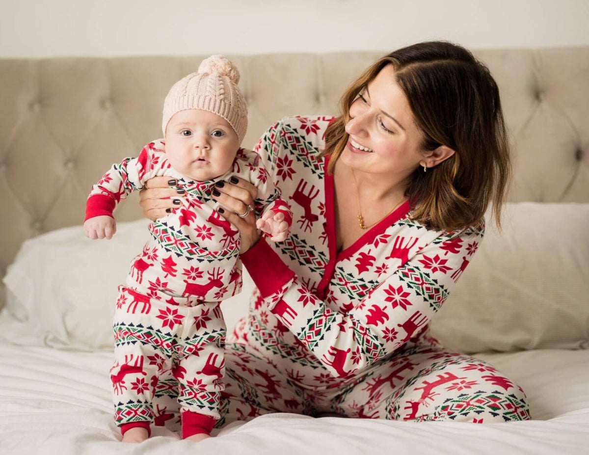 Matching family Christmas pajamas with red reindeer Fair Isle print and red ribbed cuffs - view 4