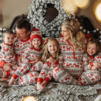 Matching family Christmas pajamas with red reindeer Fair Isle print and red ribbed cuffs - view 9
