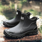 Women's slip-on Chelsea rain ankle boots with glossy toe cap and lug sole