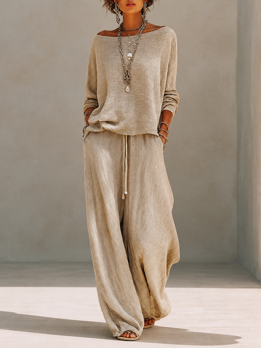 Model in a slouchy khaki knit sweater set with wide leg drawstring pants