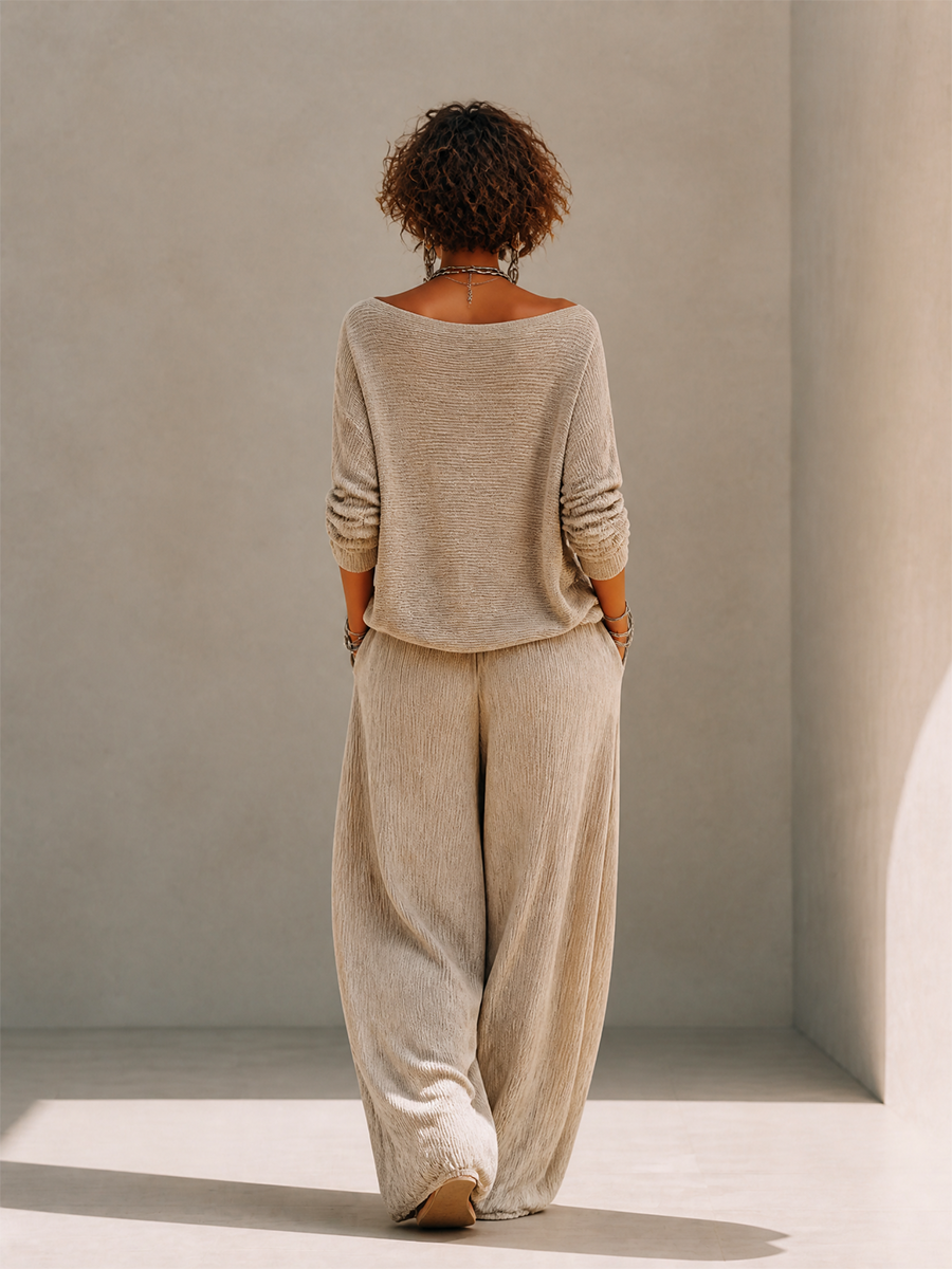 Model in a slouchy khaki knit sweater set with wide leg drawstring pants - view 3