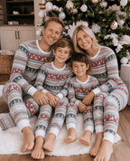 Matching family Christmas pajamas in red, green and gray Nordic reindeer and snowflake print with white cuffs - view 2