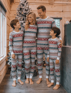 Matching family Christmas pajamas in red, green and gray Nordic reindeer and snowflake print with white cuffs - view 5