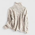 Women's openwork cable knit turtleneck sweater with rolled edges