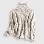 Women's openwork cable knit turtleneck sweater with rolled edges