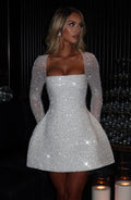 Stella long sleeve sequin homecoming mini dress with square neckline and bubble skirt