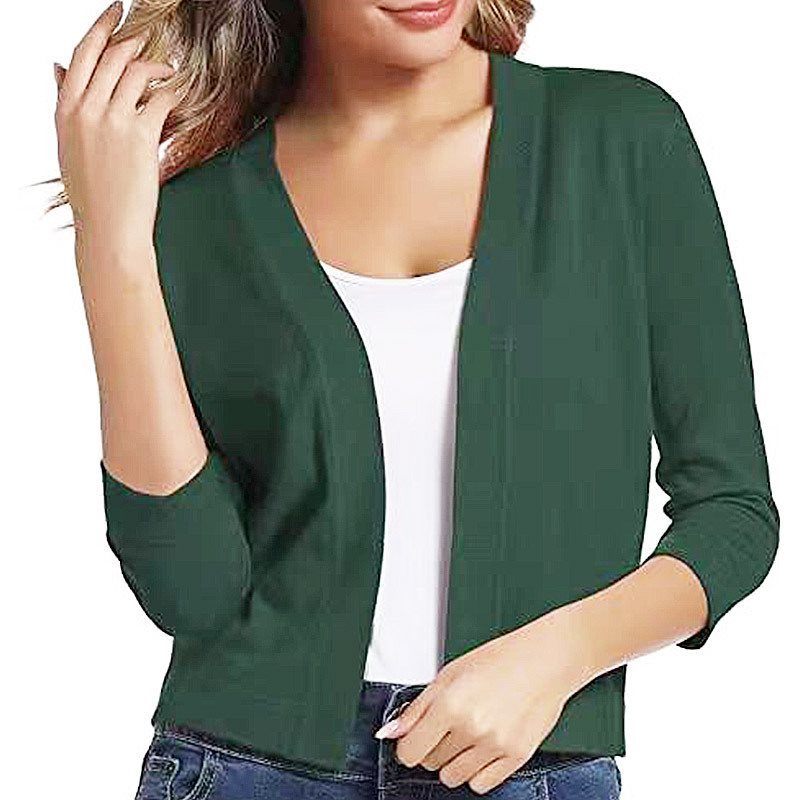 Woman wearing a cropped open front cardigan with 3/4 sleeves over a white tank and jeans - view 20