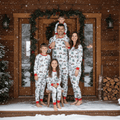 Family matching Christmas pajamas with red plaid tree truck print and red cuffs