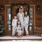 Family matching Christmas pajamas with red plaid tree truck print and red cuffs