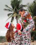 Family matching Christmas pajamas with red plaid tree truck print and red cuffs - view 5