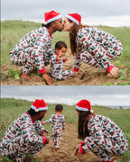 Family matching Christmas pajamas with red plaid tree truck print and red cuffs - view 6
