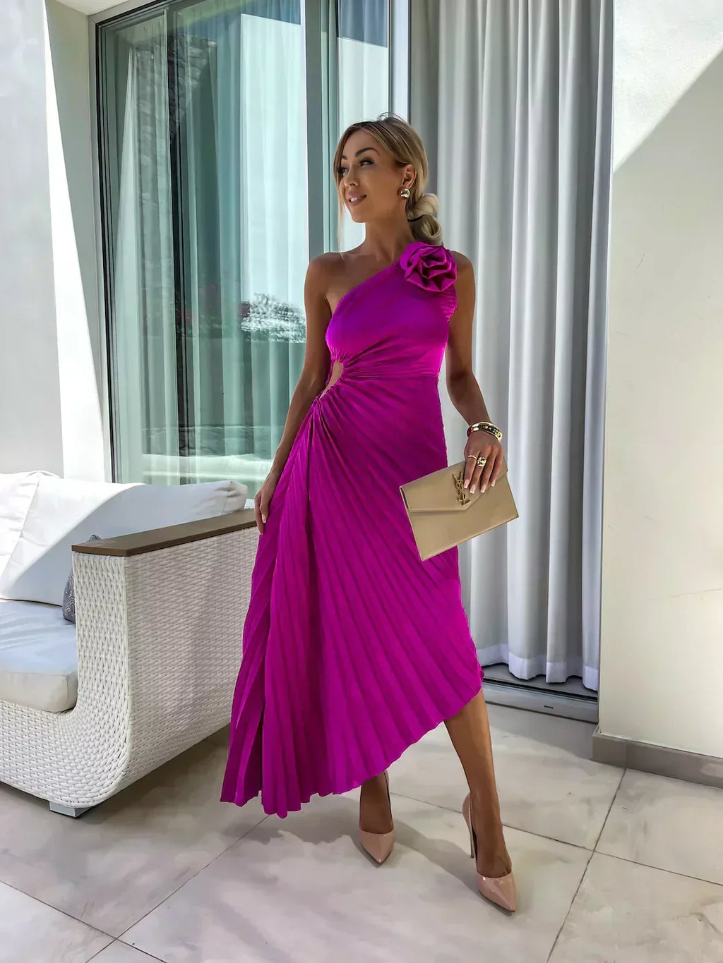 Woman wearing a one-shoulder pleated satin midi dress with a shoulder rosette, waist cutout and asymmetric hem - view 13