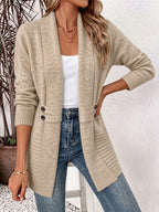 Womens shawl cardigan in heathered knit with button tab waist detail, worn open over a white tank and jeans - view 10
