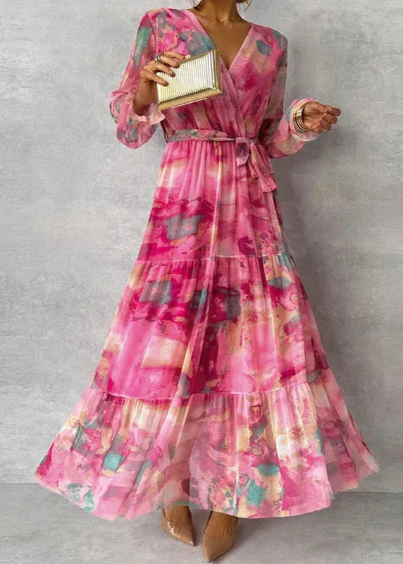 Pink watercolor print long sleeve tiered maxi wedding guest dress with tie waist