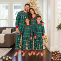Family wearing matching green Fair Isle Christmas pajamas with red cuffs