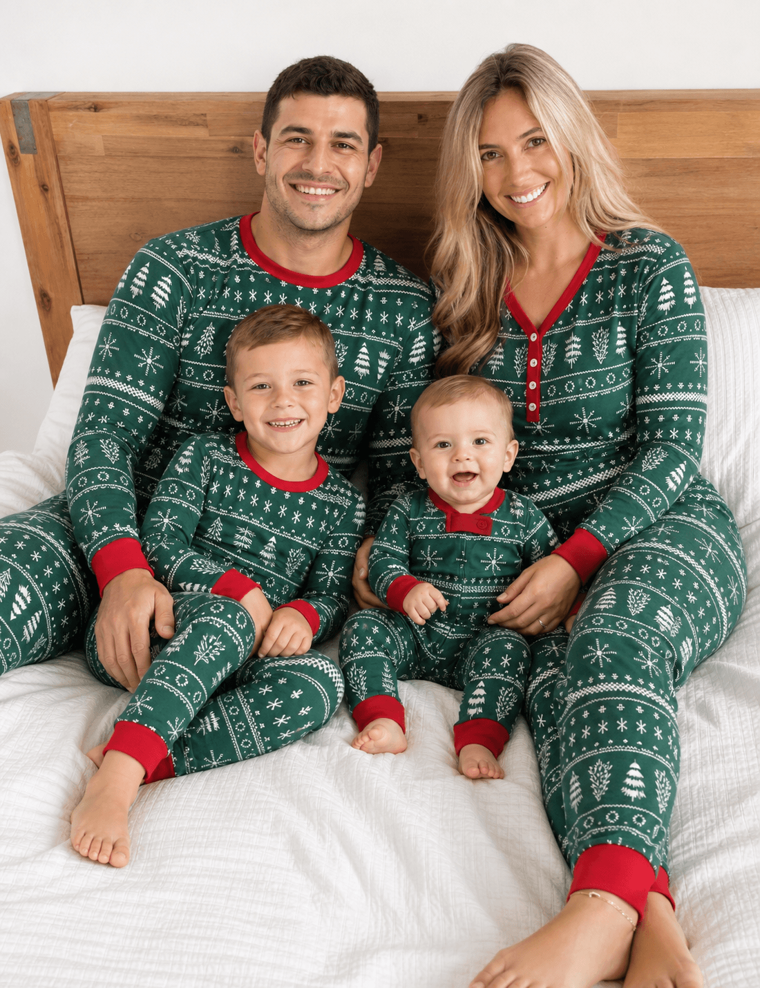 Family wearing matching green Fair Isle Christmas pajamas with red cuffs - view 2