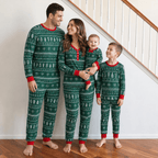 Family wearing matching green Fair Isle Christmas pajamas with red cuffs - view 3
