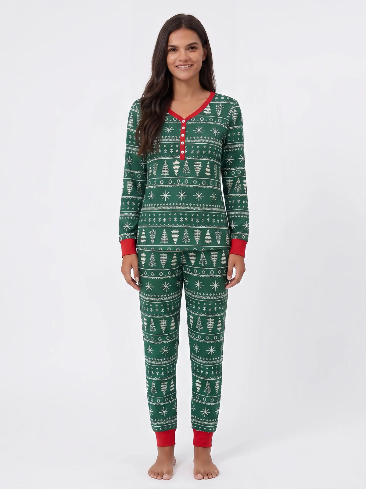 Family wearing matching green Fair Isle Christmas pajamas with red cuffs - view 7