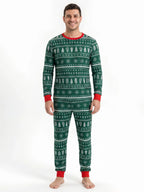 Family wearing matching green Fair Isle Christmas pajamas with red cuffs - view 9