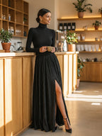 Two-piece black turtleneck and crinkle pleated maxi skirt outfit - view 3