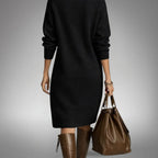 Woman wearing a long sleeve midi sweater dress with a buttoned stand collar and knee-high boots - view 9