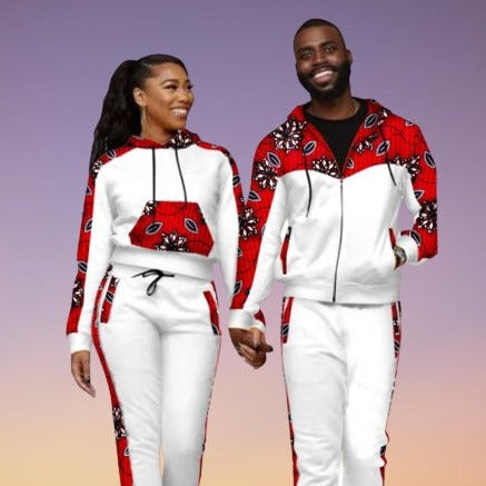 Couple wearing matching printed hoodie and jogger tracksuit sets