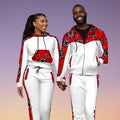 Couple wearing matching printed hoodie and jogger tracksuit sets