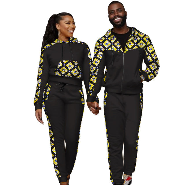 Couple wearing matching printed hoodie and jogger tracksuit sets - view 6