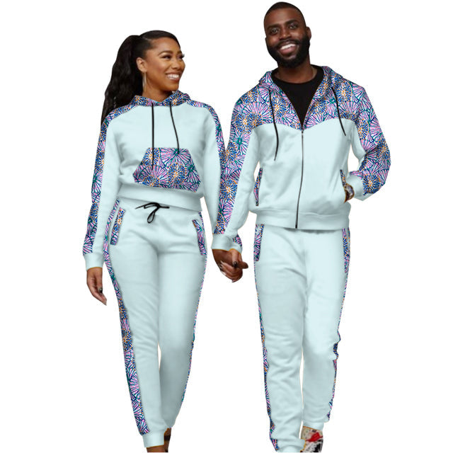 Couple wearing matching printed hoodie and jogger tracksuit sets - view 7
