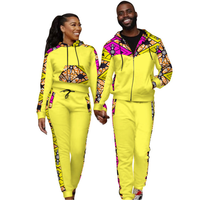 Couple wearing matching printed hoodie and jogger tracksuit sets - view 8